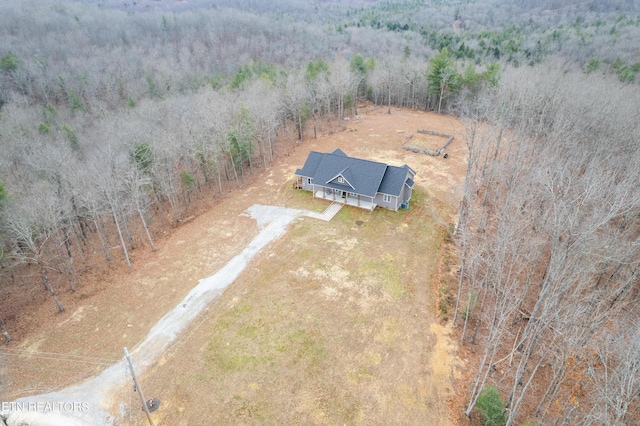 499 Woodland Trl, Sunbright, TN 37872 - overview of rural landscape with a heavily wooded area