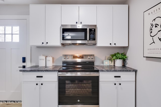 kitchen featuring white cabinets and stainless steel appliances