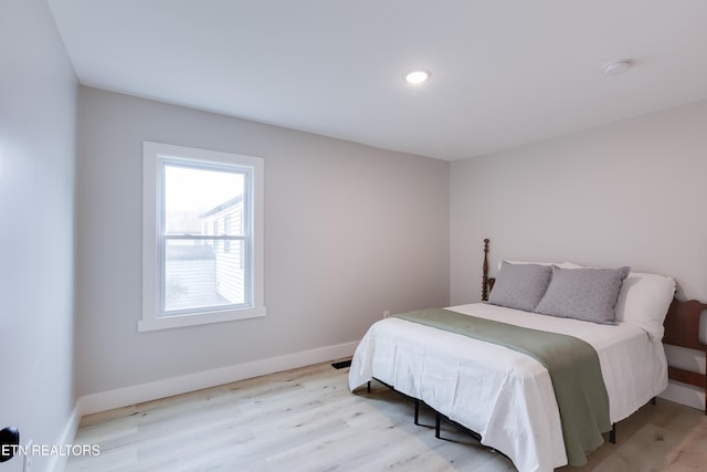 bedroom featuring light hardwood / wood-style floors