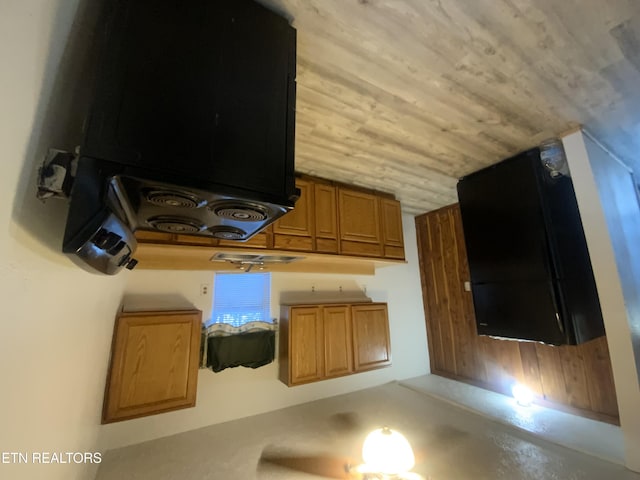 interior space with wood ceiling and exhaust hood