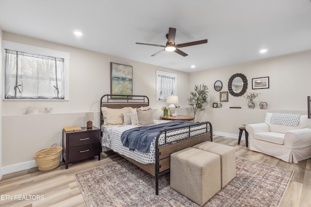 bedroom featuring ceiling fan, recessed lighting, wood finished floors, and baseboards