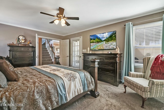 bedroom with light carpet, ceiling fan, and crown molding