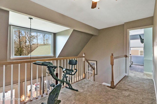 hallway featuring carpet