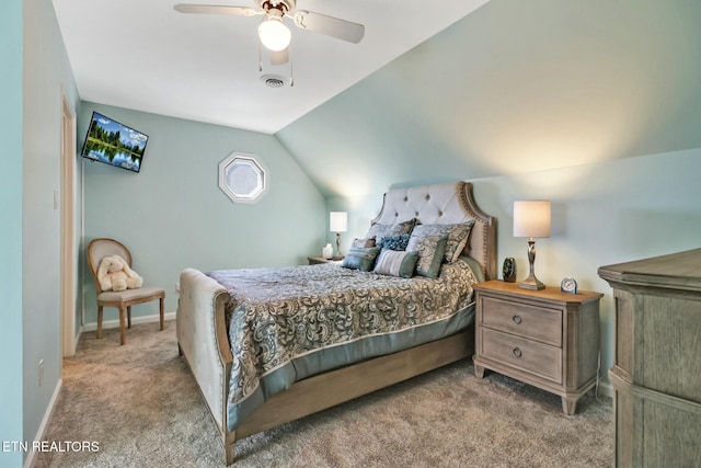 bedroom featuring ceiling fan, light carpet, and vaulted ceiling