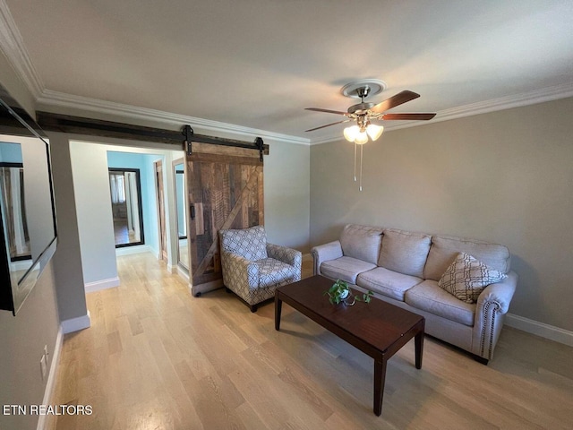 2733 Jersey Ave Unit C302, Knoxville, TN 37919 - living room with ceiling fan, a barn door, light wood-type flooring, and crown molding