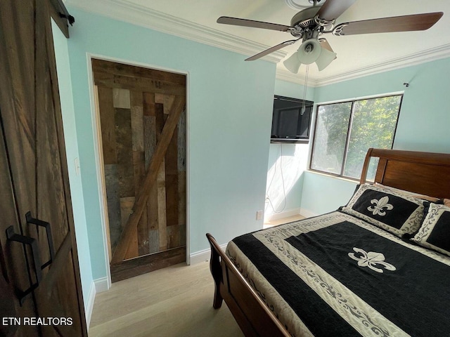 2733 Jersey Ave Unit C302, Knoxville, TN 37919 - bedroom featuring ceiling fan, light wood-type flooring, and ornamental molding