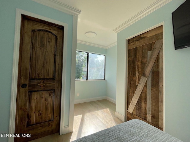 2733 Jersey Ave Unit C302, Knoxville, TN 37919 - bedroom featuring light hardwood / wood-style floors and crown molding