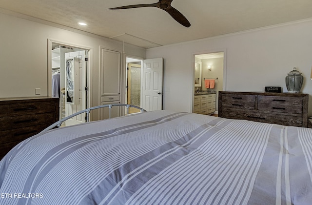 bedroom featuring a closet, ceiling fan, and ornamental molding