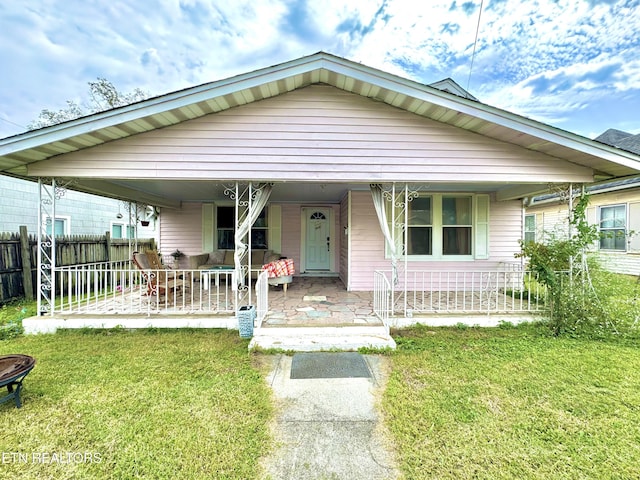 118 E Caldwell Ave, Knoxville, TN 37917 - view of front of home featuring a front yard and a porch
