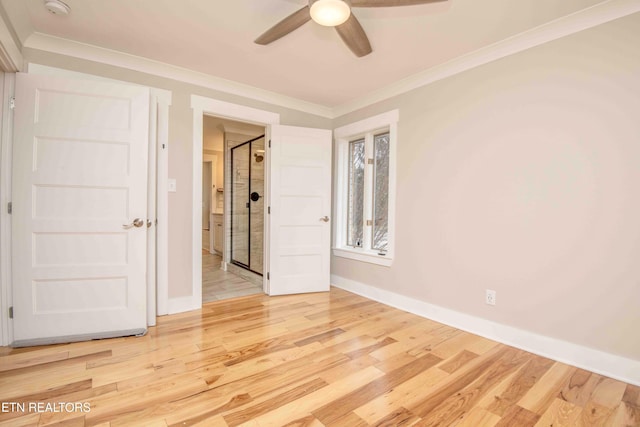 spare room featuring hardwood / wood-style floors, ceiling fan, and ornamental molding