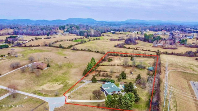 aerial view featuring a mountain view and a rural view