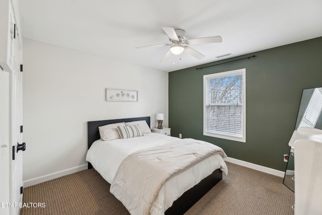 carpeted bedroom featuring ceiling fan