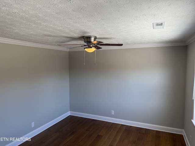 empty room with ceiling fan, dark wood-type flooring, crown molding, and a textured ceiling