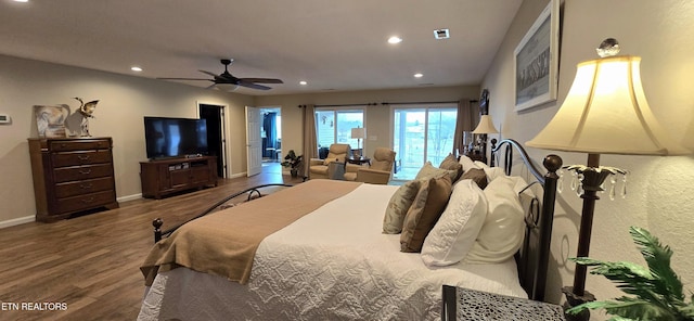 bedroom with hardwood / wood-style floors, ceiling fan, and access to exterior