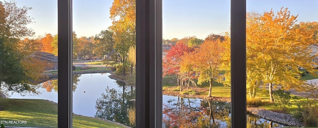 entryway with a water view