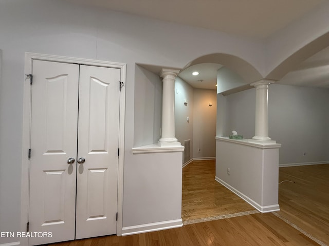 hallway featuring hardwood / wood-style flooring