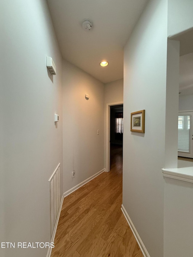 hall featuring light hardwood / wood-style floors