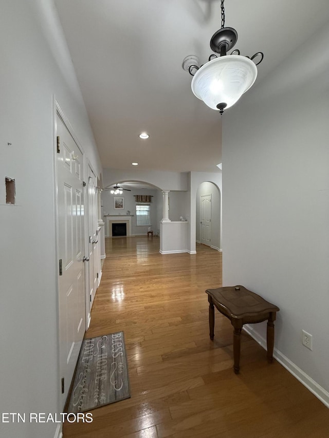 hall with light hardwood / wood-style flooring