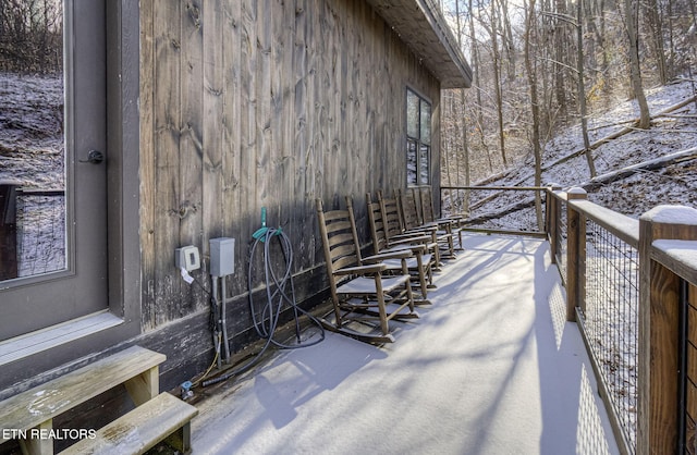 view of snow covered deck