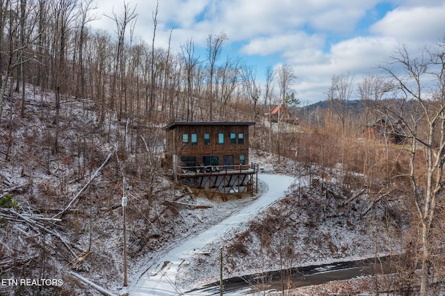 view of snow covered property