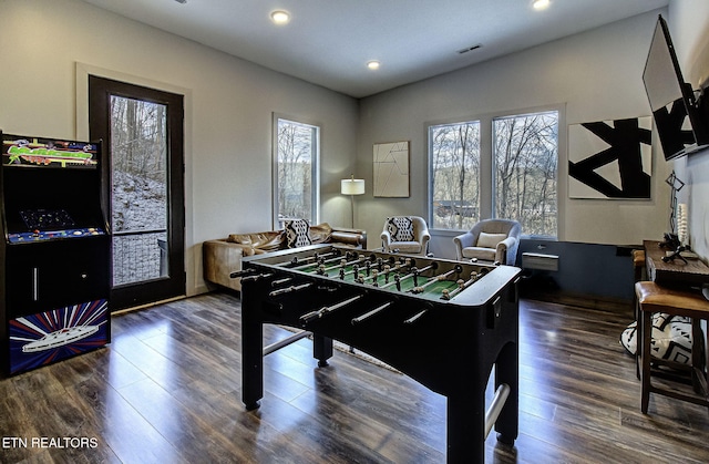 game room featuring dark hardwood / wood-style floors