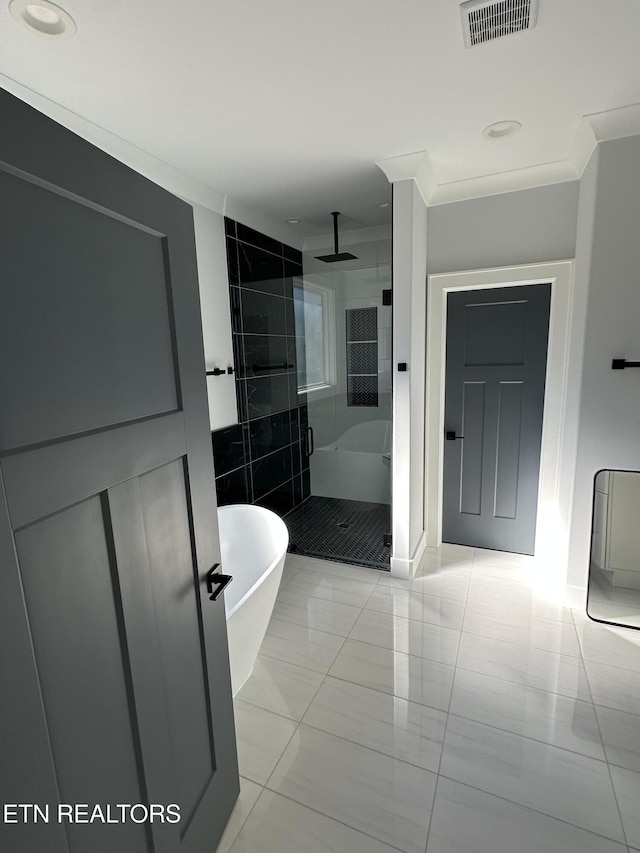 bathroom with tile patterned floors, crown molding, and independent shower and bath