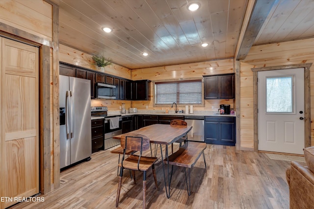 kitchen featuring light hardwood / wood-style flooring, stainless steel appliances, dark brown cabinetry, wooden ceiling, and sink