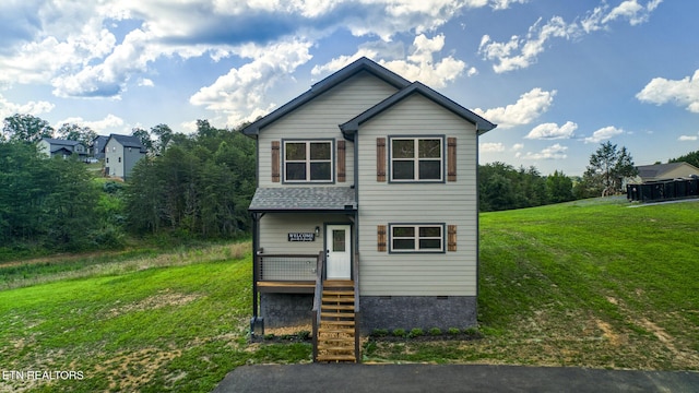 front facade with a front lawn