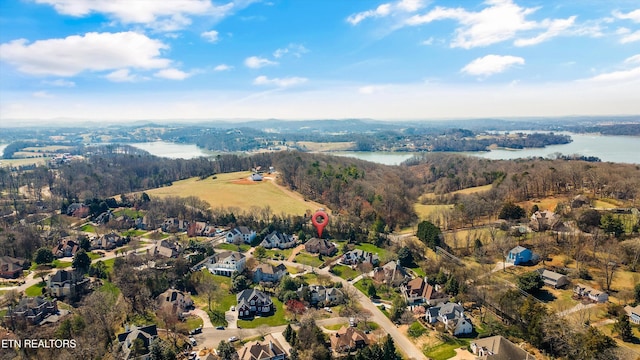 aerial view featuring a residential view and a water view