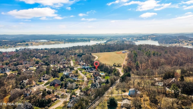 drone / aerial view with a water view