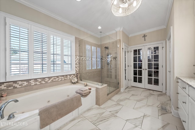 bathroom featuring a shower stall, a jetted tub, crown molding, french doors, and marble finish floor