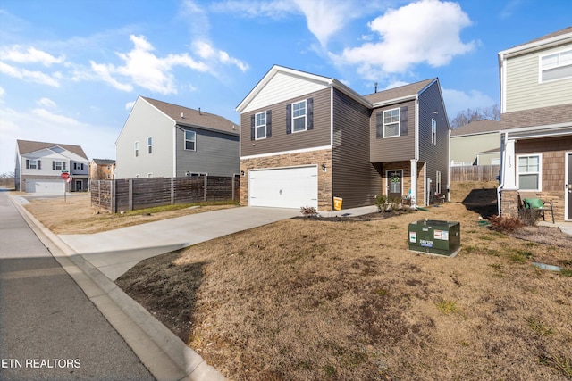 view of front facade featuring a garage and a front lawn