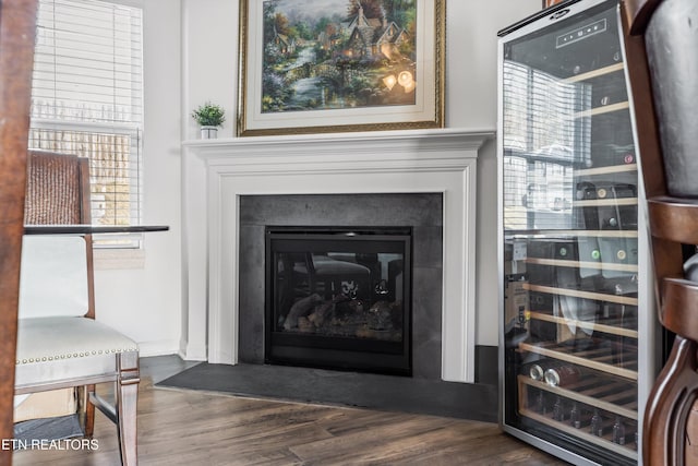 details with wine cooler and hardwood / wood-style floors