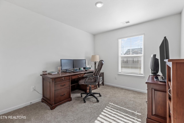 office space with light carpet