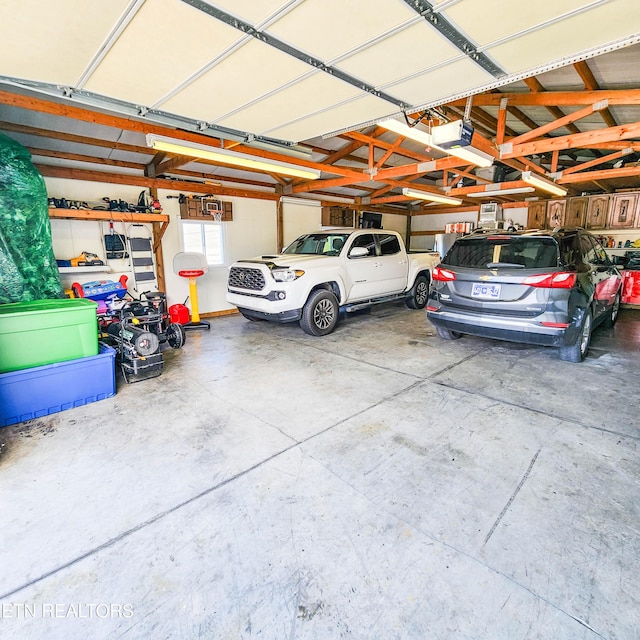 garage featuring a garage door opener