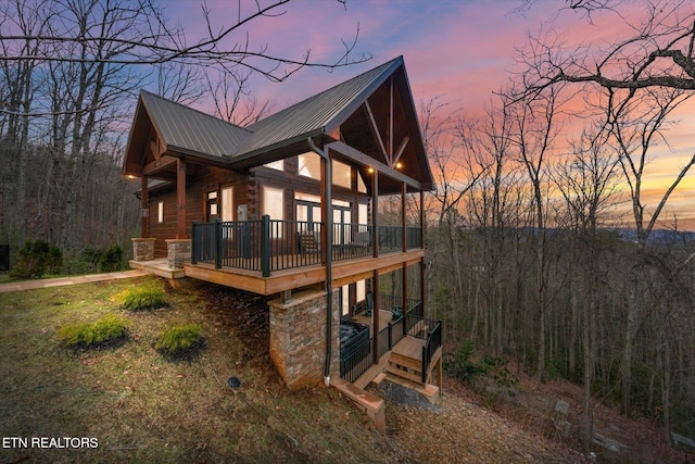 view of property exterior at dusk