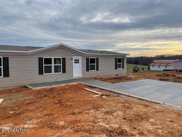 manufactured / mobile home with a patio