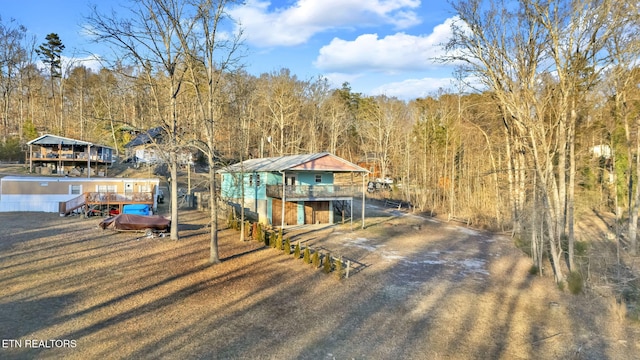 exterior space featuring a wooden deck