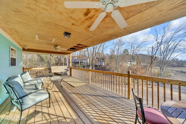 wooden deck with ceiling fan