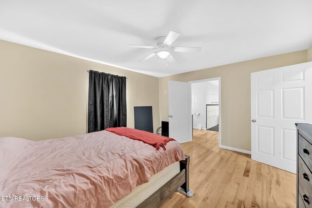 bedroom with ceiling fan and light hardwood / wood-style flooring