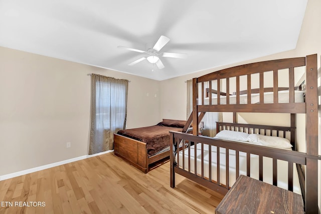 bedroom featuring ceiling fan and light hardwood / wood-style flooring