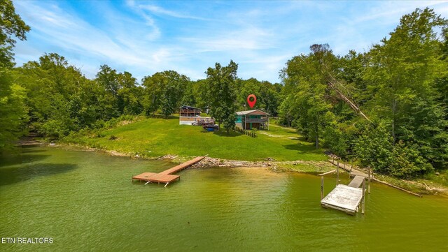 1429 Sunbeam Ln, Dandridge, TN 37725 - view of subject property featuring a nearby body of water and a heavily wooded area