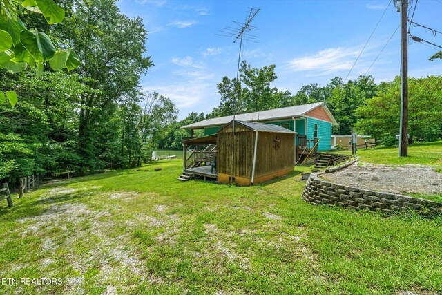 1429 Sunbeam Ln, Dandridge, TN 37725 - view of green lawn featuring an outbuilding
