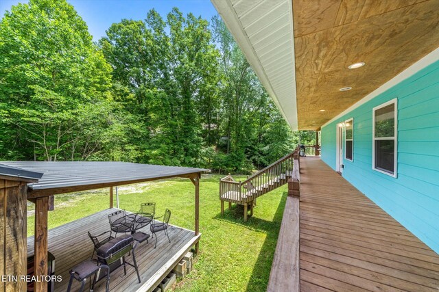 1429 Sunbeam Ln, Dandridge, TN 37725 - view of grassy yard with a wooden deck and stairs