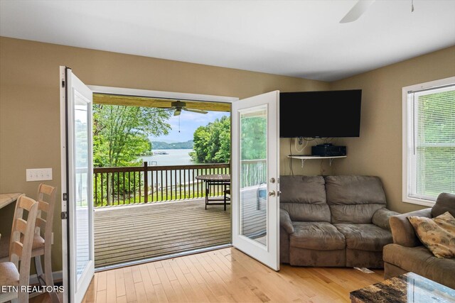 1429 Sunbeam Ln, Dandridge, TN 37725 - living area featuring ceiling fan, light wood finished floors, and french doors