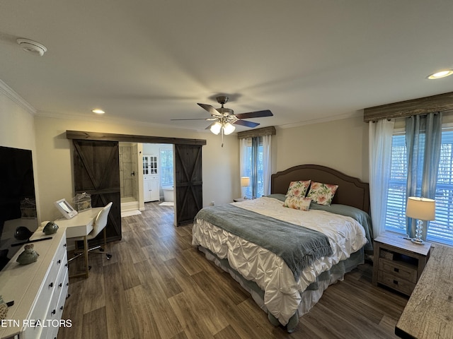 bedroom featuring ceiling fan, a barn door, dark hardwood / wood-style floors, crown molding, and multiple windows