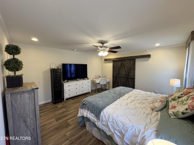 bedroom with ceiling fan, a barn door, ornamental molding, and dark wood-type flooring