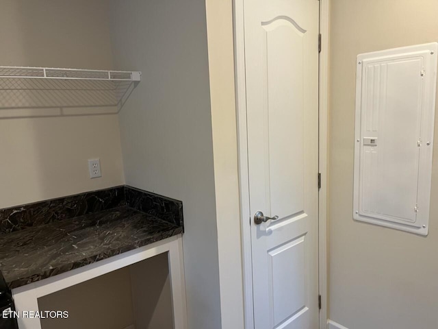 laundry area featuring electric panel