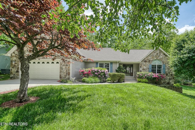 55 Loxley Ln, Crossville, TN 38558 - ranch-style house with stone siding, a garage, driveway, and a front lawn