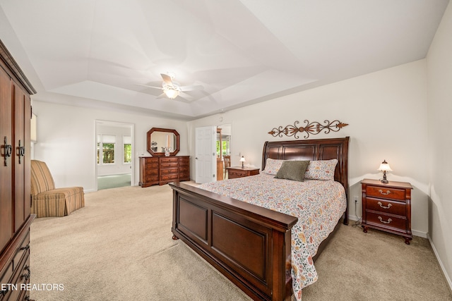 55 Loxley Ln, Crossville, TN 38558 - bedroom featuring a raised ceiling, light colored carpet, a ceiling fan, and baseboards